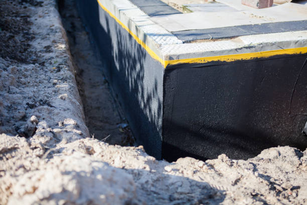Professional Waterproofing technician working in Whitesburg, KY